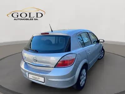Opel Astra 1.8i 16V Enjoy — Berline fiable et économique, historique sans sinistre — side view