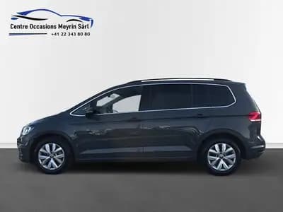 VW Touran 1.5 TSI EVO Comfortline — Monospace 7 places fiable, essence performante — side view