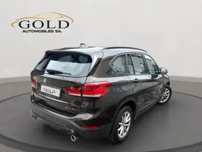 BMW X1 xDrive 18d Essential Edition — SUV compact diesel, un seul propriétaire, expertise complète — side view