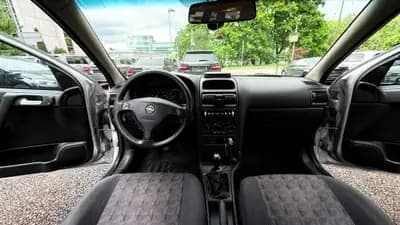Opel Astra Caravan 1.8i 16V — Familiale spacieuse, moteur fiable et sans sinistre — Miniatur 9