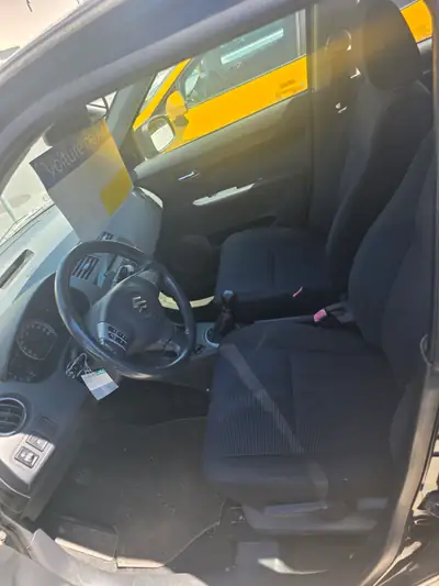 Suzuki Swift 1.3 4WD — tableau de bord