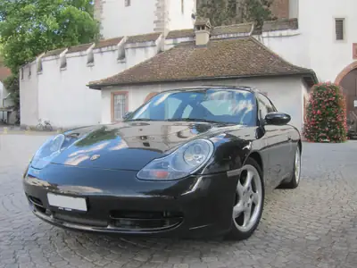 Porsche 911 Carrera 4 1999 — Coupé sportif AWD, entretien Porsche complet — vue extérieure