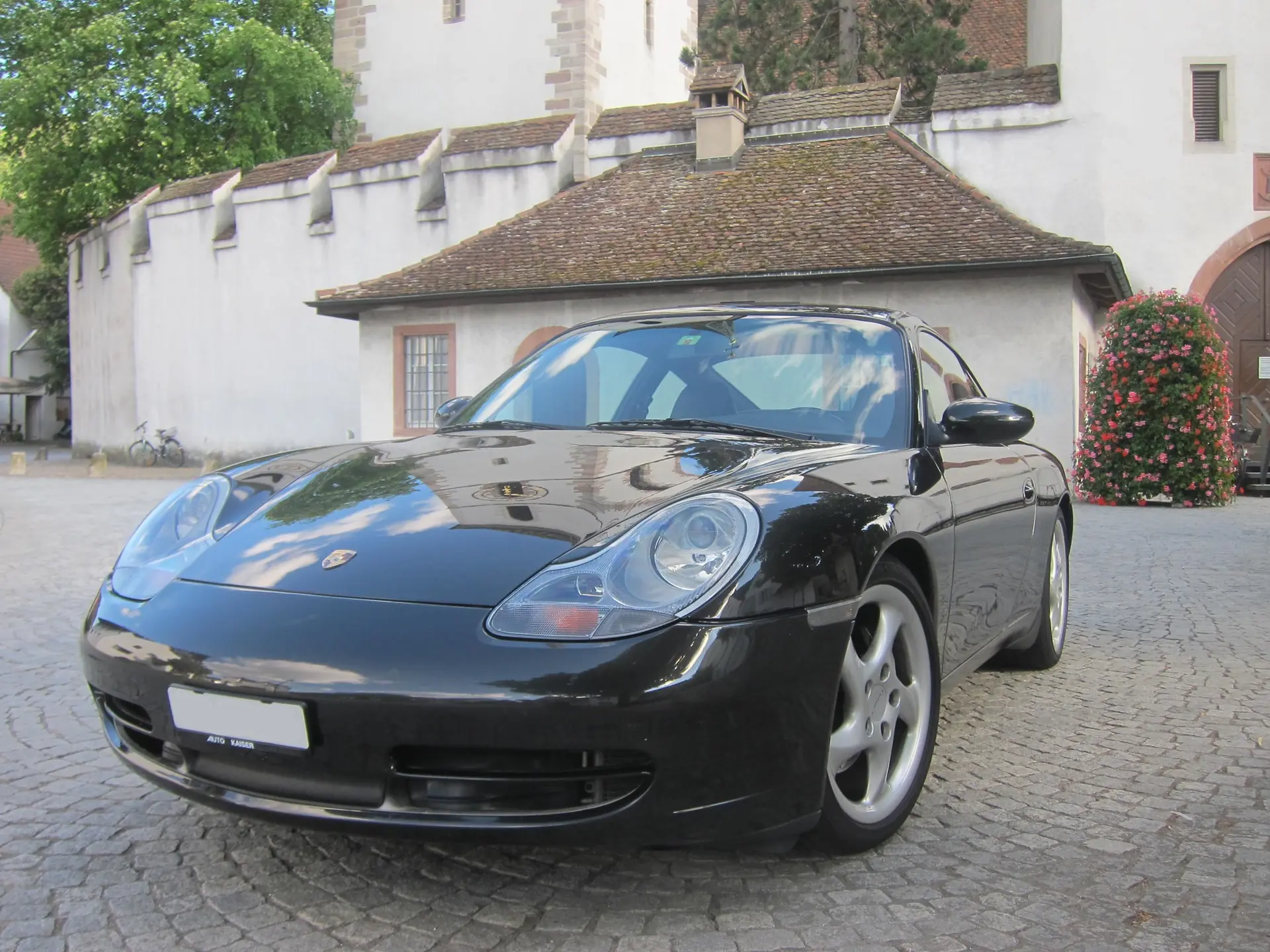 Porsche 911 Carrera 4 1999 — Coupé sportif AWD, entretien Porsche complet — vue extérieure
