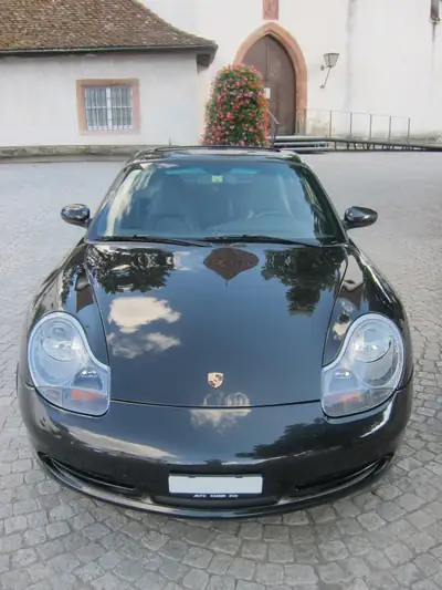 Porsche 911 Carrera 4 1999 — Coupé sportif AWD, entretien Porsche complet — côté