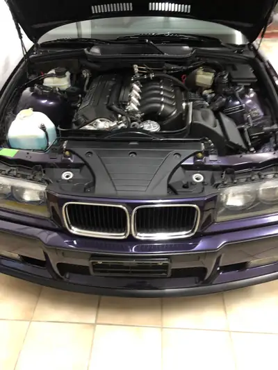 BMW M3 Coupé 1996 — Légende sportive violet métallisé, 321 ch purs — Miniatura 16