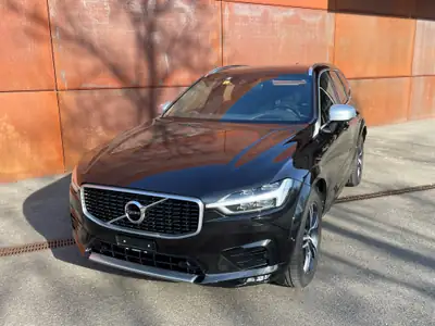 Volvo XC60 D4 AWD R-Design — SUV premium diesel, 4x4 intégral et design affirmé — side view