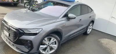 Audi Q4 Sportback e-tron 50 quattro — SUV électrique premium, 25 000 km seulement — Heckansicht