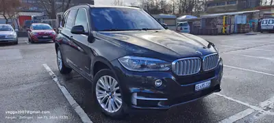 BMW X5 xDrive 40e iPerformance — SUV hybride rechargeable premium, 190'000 km — arrière
