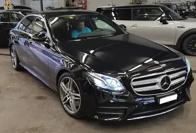 Mercedes-Benz E 450 AMG Line 4Matic — Berline premium avec 367 ch et transmission 9G-Tronic — Seitenansicht