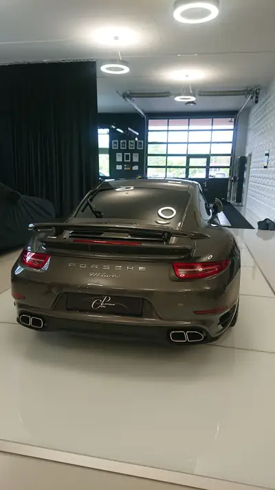 Porsche 911 Turbo PDK — Coupé haute performance, état quasi neuf avec 56'650 km — côté