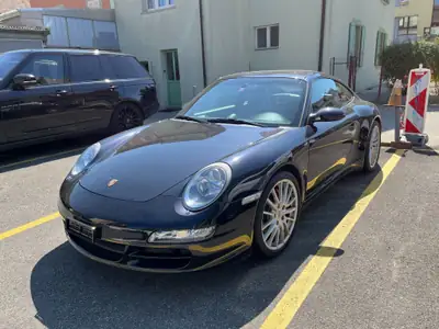 Porsche 911 Carrera 4S 2007 — Coupé sportif légendaire, 385 cv et transmission manuelle — côté