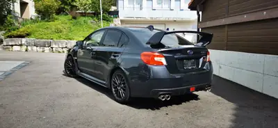 Subaru WRX STI Sport S 2.5 Turbo 4WD — Berline sportive haute performance, entretien impeccable — fianco