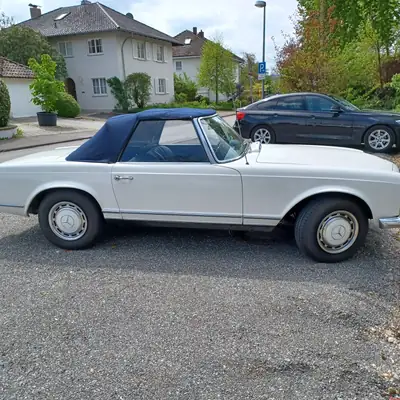 Mercedes-Benz SL 250 (W113) 1967 — Roadster légendaire, 84'000 km, teinte blanche immaculée — vista posteriore