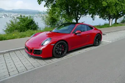 Porsche 911 Carrera 4 GTS PDK — Sportive légendaire, 450 ch et histoire sans sinistre — vista posteriore