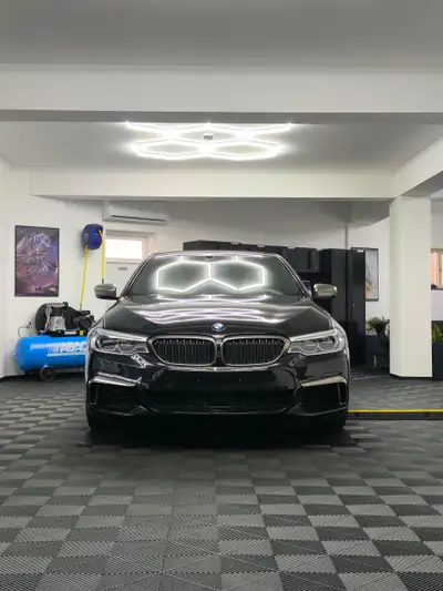 BMW M550i xDrive — Berline sportive 462 ch, garantie constructeur jusqu'en 2027 — exterior view