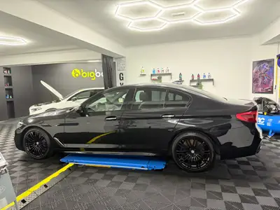BMW M550i xDrive — Berline sportive 462 ch, garantie constructeur jusqu'en 2027 — rear view
