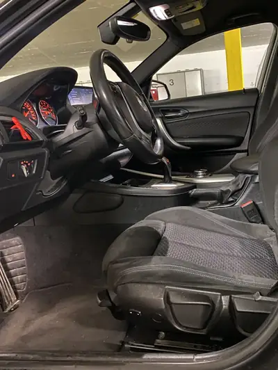 BMW M135i xDrive Steptronic — Berline sportive 320 ch, transmission automatique — dashboard