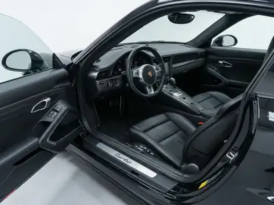Porsche 911 Turbo PDK — Sportive légendaire, 521 ch et seulement 34'000 km — side view