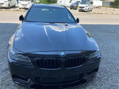BMW M550d xDrive Touring — Break sportif diesel 381 ch, entretien impeccable — rear view