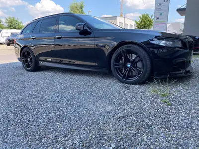 BMW M550d xDrive Touring — Break sportif diesel 381 ch, entretien impeccable — exterior view