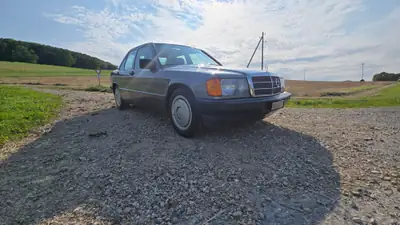 Mercedes-Benz 190E 2.3 — Classique d'exception, 57'000 km, vernis d'origine — Seitenansicht