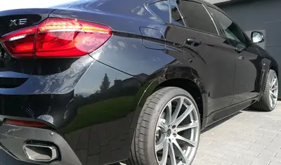 BMW X6 xDrive 30d — SUV coupé premium, 32000 km, service gratuit inclus — côté