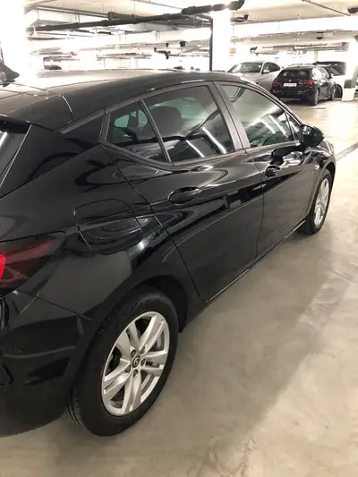 Opel Astra 1.4i Turbo Enjoy — Berline dynamique, 36 400 km seulement — côté