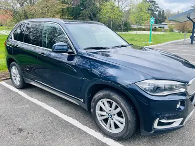BMW X5 xDrive 40e iPerformance — SUV hybride rechargeable, entretien complet — côté