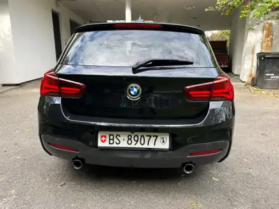 BMW M140i xDrive Steptronic — Berline sportive 340 ch, sans OPF et Akrapovic — vista posteriore