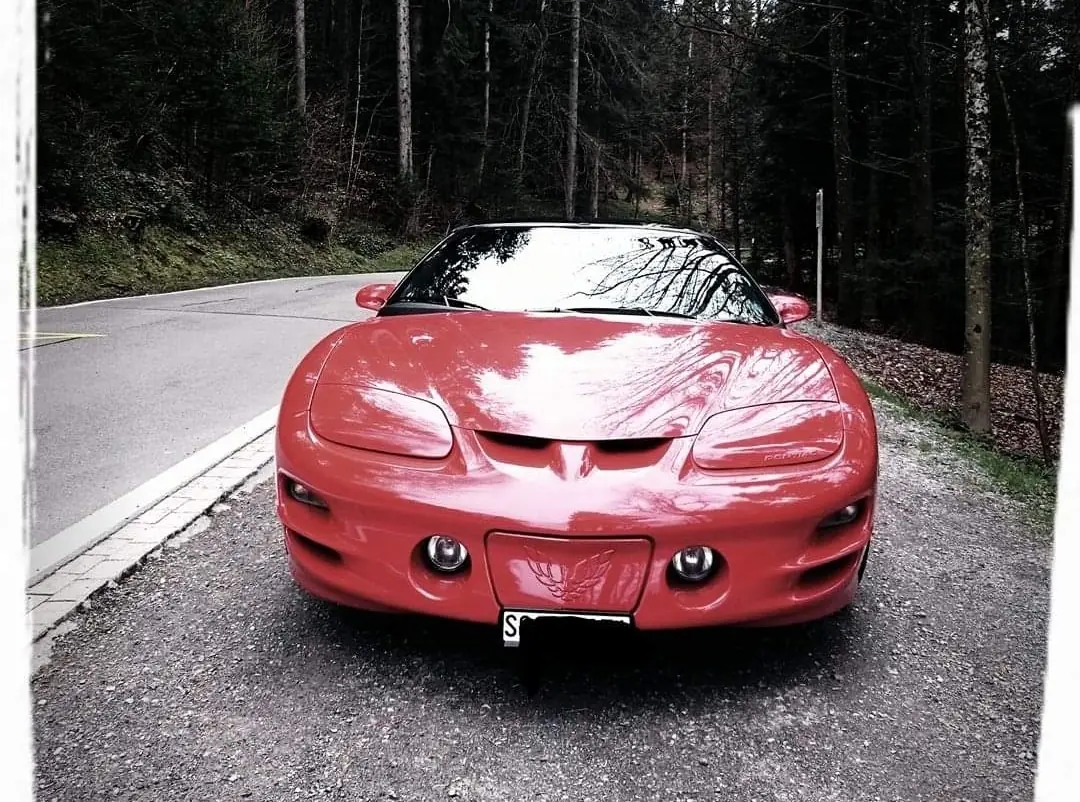 Pontiac Firebird Trans Am 5.7 V8 — Muscle car mythique, édition 1998 impeccable — vue extérieure