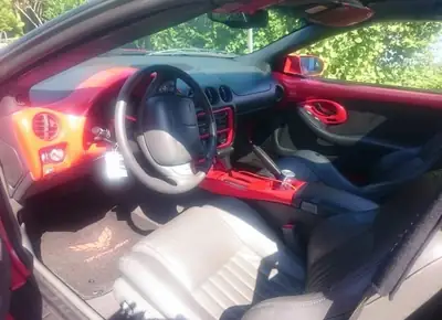 Pontiac Firebird Trans Am 5.7 V8 — Muscle car mythique, édition 1998 impeccable — tableau de bord