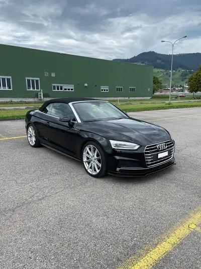 Audi A5 Cabriolet 3.0 TDI — Élégance décapotable, diesel performant et équipement S-Line — Heckansicht