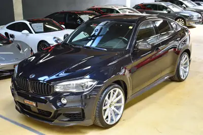 BMW X6 M50d Steptronic — SUV coupé diesel 381 ch, sans accident, service gratuit 10 ans — côté
