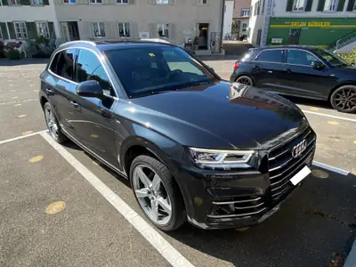 Audi Q5 55 TFSI e quattro — SUV hybride rechargeable, 115'000 km, design gris métallisé — vista esterna
