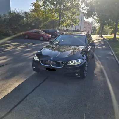 BMW 550i Touring Luxury Line — Break sportif 520 ch, seulement 147'000 km — côté