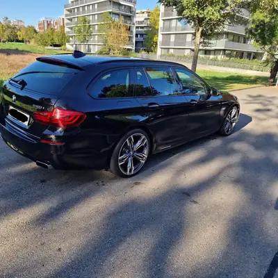 BMW 550i Touring Luxury Line — Break sportif 520 ch, seulement 147'000 km — arrière
