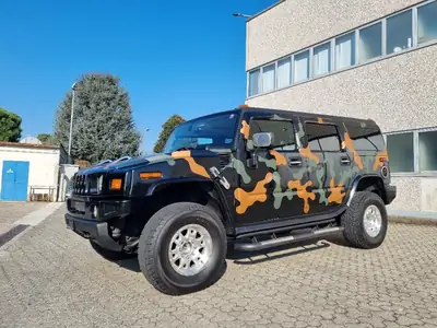 HUMMER H2 6.0 Luxury — Le SUV mythique américain, motorisation 316 ch — fianco