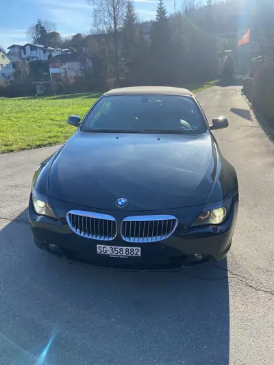 BMW 650i Cabriolet — Élégance sportive et puissance brute, 125 000 km — fianco