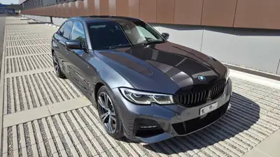 BMW 330e Steptronic M Sport — Berline hybride rechargeable, 89 900 km, état impeccable — vue extérieure