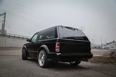 GMC Typhoon 1993 — SUV Muscle légendaire, Widebody Custom unique — Miniature 7