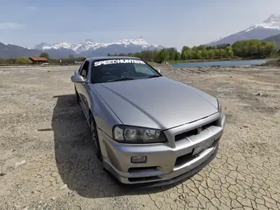 Nissan Skyline R34 — Coupé légendaire, 527 ch, boîte manuelle, sans sinistre — Miniatura 7