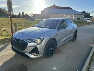 Audi e-tron 55 Sportback quattro — SUV électrique premium, 38 500 km seulement — fianco