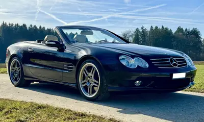 Mercedes-Benz SL 600 — Cabriolet légendaire, 500 ch et état d'origine exceptionnel — Miniatura 17