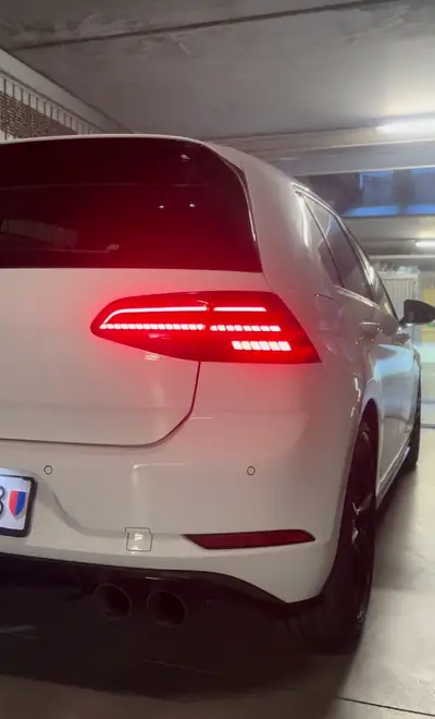 VW Golf 2.0 TSI R 4Motion DSG — Performance 301 ch, Transmission intégrale, 123'000 km — side view