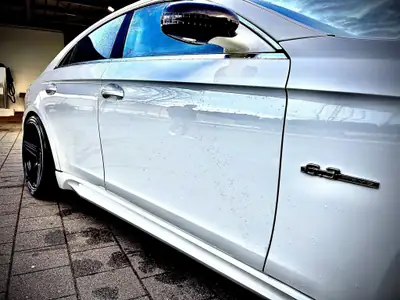 Mercedes-Benz CLS 63 AMG — Berline sportive légendaire, 515 ch de pure performance — Seitenansicht