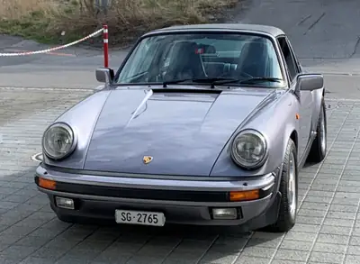 Porsche 911 Targa Jubilé 1988 — Chef-d'œuvre cabriolet, matching numbers, CH-Auslieferung — fianco