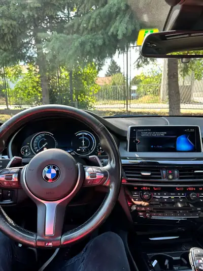 BMW X5 xDrive M50d Steptronic — SUV premium diesel, 381 ch et transmission automatique — Miniature 9