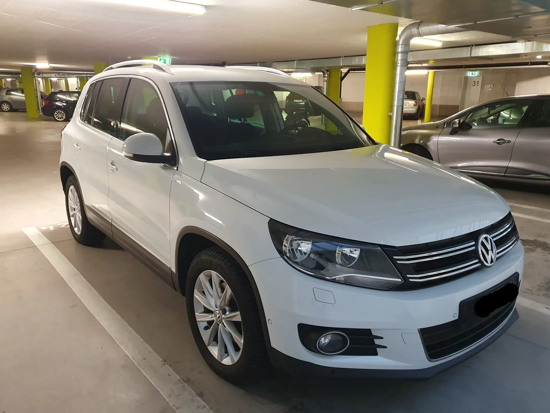 VW Tiguan 1.4 TSI Sport&Style 4Motion — SUV polyvalent 4x4, traction intégrale et assistant de stationnement