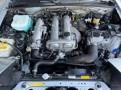 Mazda MX-5 1.6i — Le roadster mythique des années 90, argent métallisé et sans accident — Miniatura 12