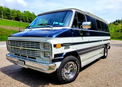 Chevrolet G-Van Chevy G-20 — Mythique fourgon aménagé V8 5.0L, toit relevable — côté